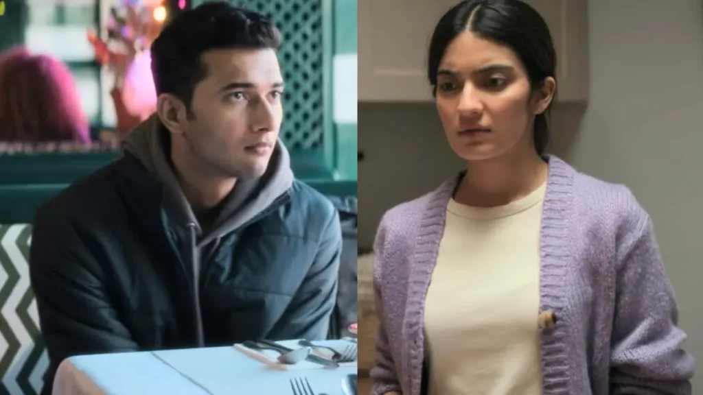 Young Indian man and woman having a serious discussion at a cafe table